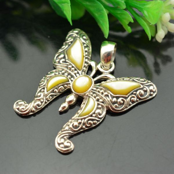 

925 sterling silver yellow shell of carve patterns or designs on woodwork butterfly pendant female, Black