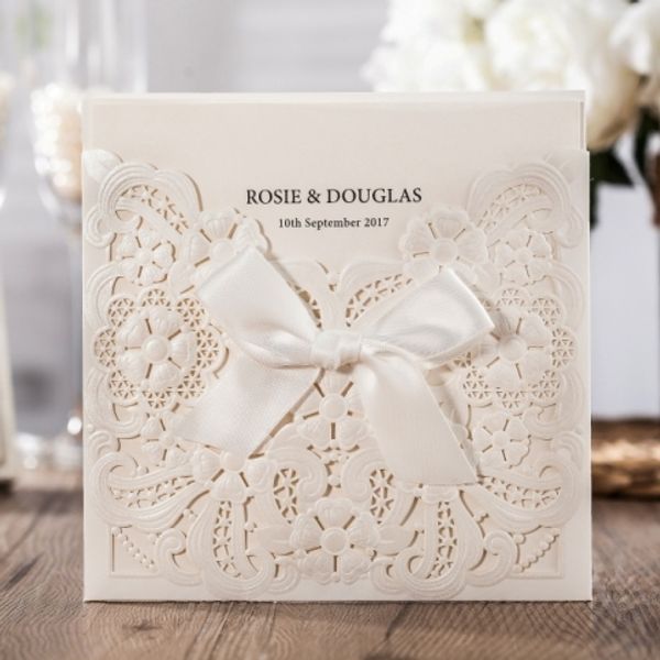 

wedding invitation card with laser cut embossed floral and bow cw6112