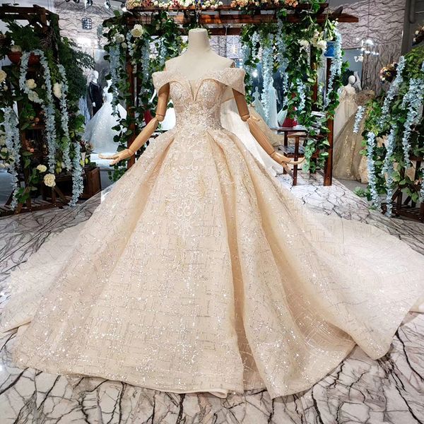

2019 latest lebanon wedding dresses illusion sweetheart neck short sleeve backless lace up back sequins appliques pattern bridal gowns, White