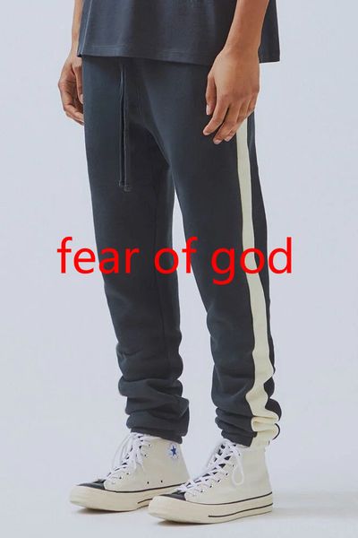 

fear of god essentials 19ss sidestripe colorblock drawstring fog pants designer pants for men and women