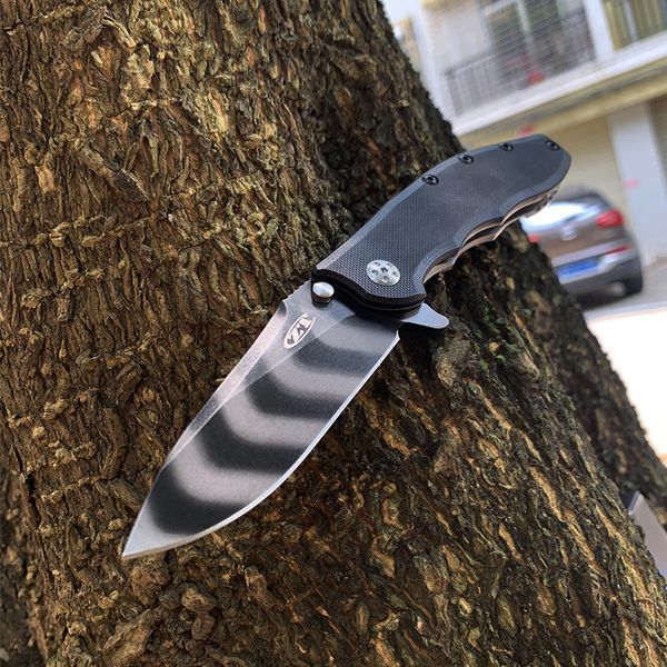 

Zt Zero Tolerance 0562TS Hinderer Slicer Pocket Knife Tiger Stripe CPM-20CV Plain Edge Tactical Hunting Folding Knife