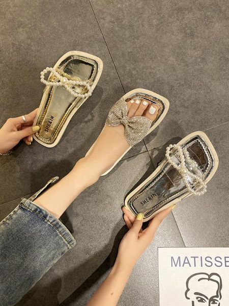 

slippers female ins tide 2020 new summer korean version of the wild net red bow rhinestone pearl open toe flat drag, Black