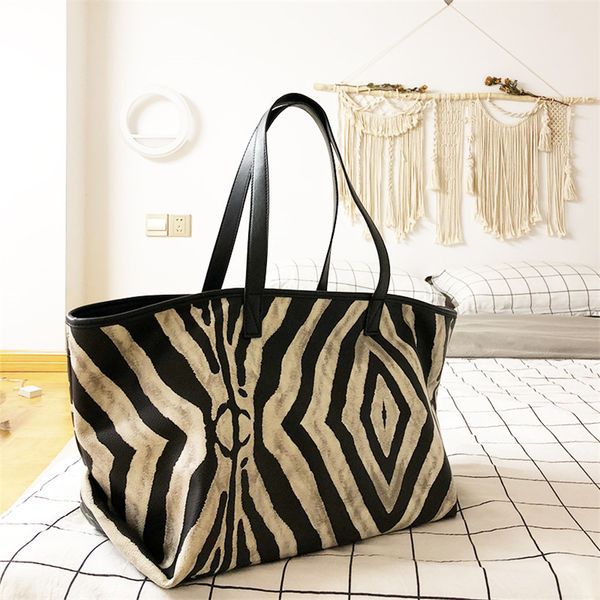

designer handbag zebra pattern portable new women's bag in large capacity travel single shoulder fashion versatile tote bag 5