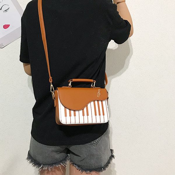 

a generation of fat new piano handbags fashion korean-style shoulder messenger piano keys small square bag foreign trade handbags