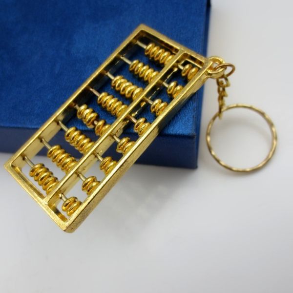 Pingente de latão banhado a ouro de 6 cm de trompete pingente de ouro abacus key fivela