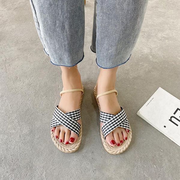 

two wearing sandals female ins tide 2020 new summer students wild flat fashion comfortable roman shoes, Black