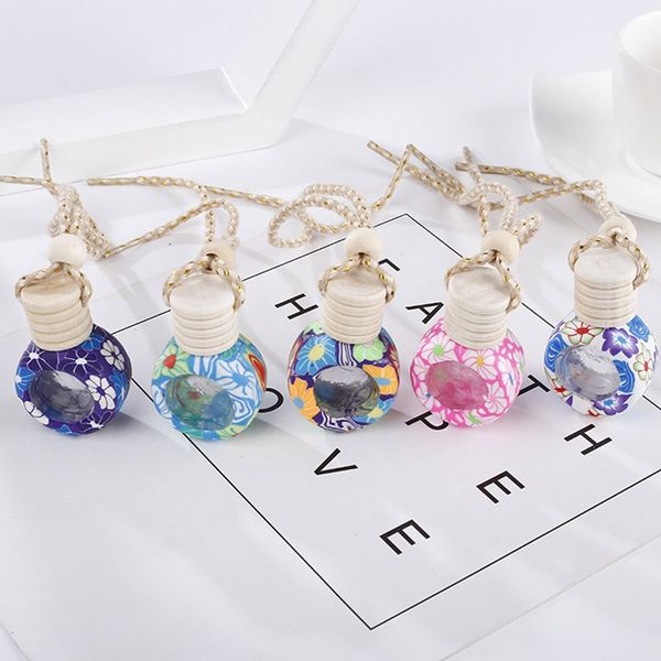 

high grade car pendant car brooches air freshener color perfume bottle this product is an empty bottle random colors