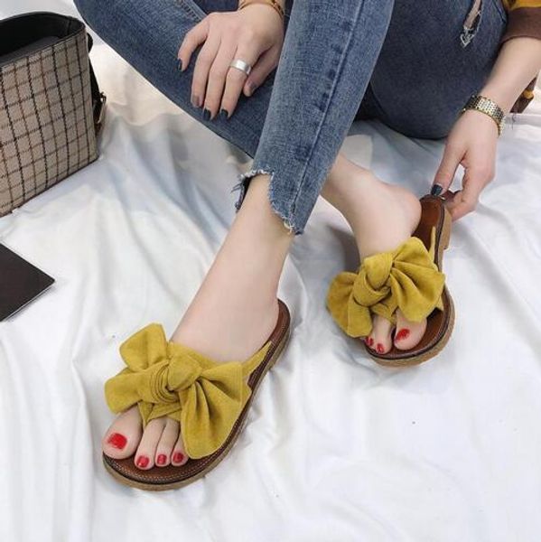 

Verano Venta caliente mujeres chancletas moda Color sólido moño Sandalias de tacón plano tamaño 36-40 zapatillas de playa al aire libre zapa