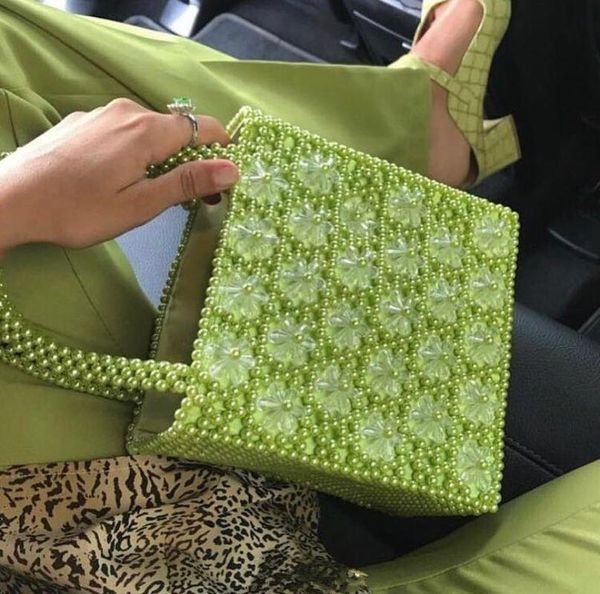 

six petals weave heart pearl bag ins with the same paragraph niche design heavy metal handbags shoulder bag
