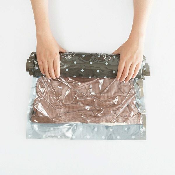 

3 sizes hand rolling compression storage bags for clothes plastic vacuum packing sacks travel space saver bags for luggage 10pcs/lot