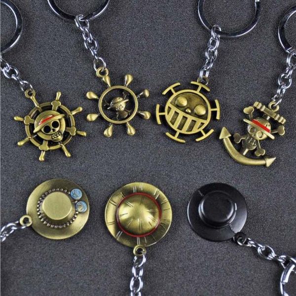 

10pcs / lot велиѬн изделий пооба keychain one piece обезна d .luffy оломенна лпка rudder  Slivery;golden