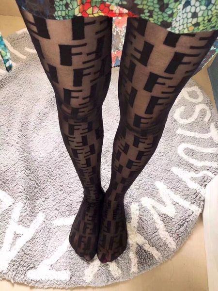 

Ff letter jacquard tight hollow ela tic lim ladie net tight women legging fd tight women ock black white