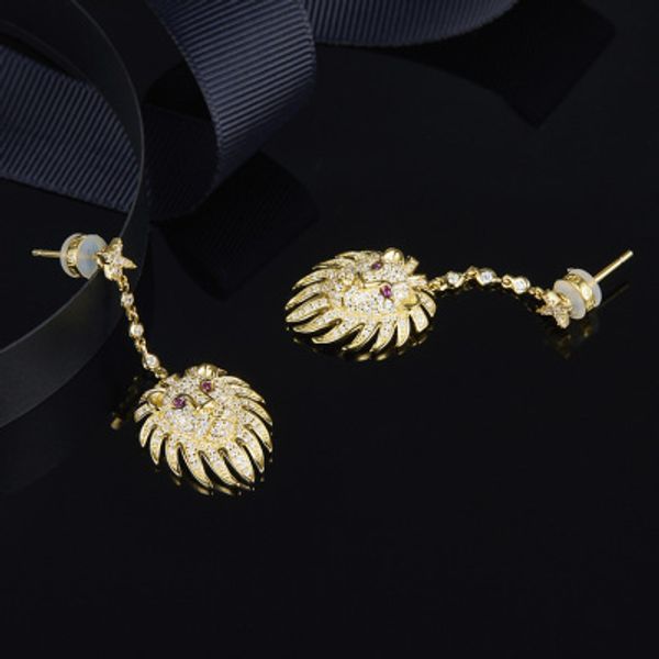 

wholesale- yellow silver lion statement earrings with synthetic red stone, Golden