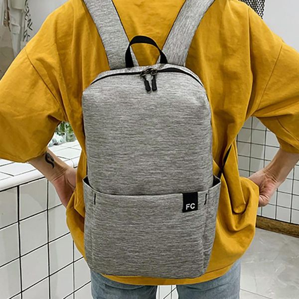 

мода женщина solid color вместимость student рюкзак открытого путешествие пар мешок школа качество водонепроницаемые мужчины рюкзак