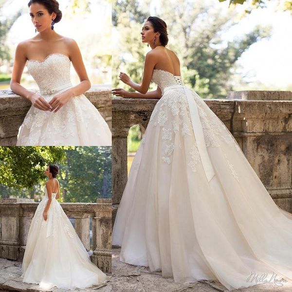 Abiti da sposa con corpetto in pizzo senza spalline con cintura rimovibile Abiti da sposa con corsetto a cuore senza maniche e fascia in nastro