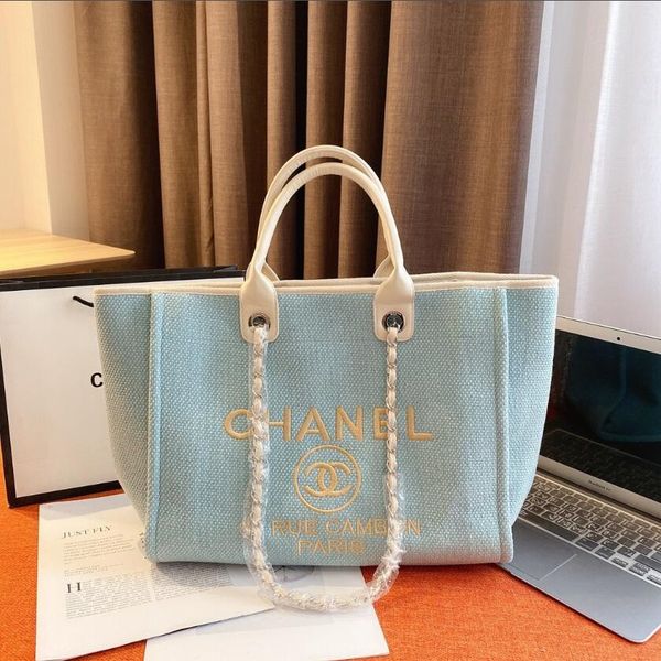 

pearl embroidered beach bag, many large and handle can be carried on one shoulder at the same time, the capacity is really large