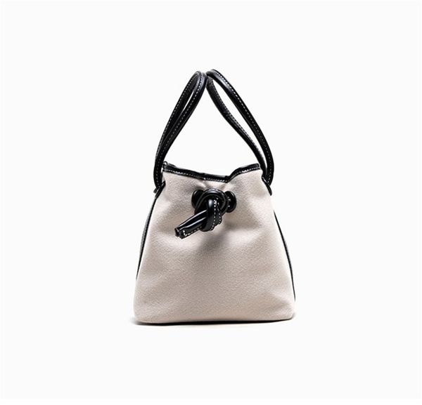 

designer handbag autumn and winter design cloth drawstring button bucket bags thousand bird pattern simple lamb hair bag shoulder bags 7