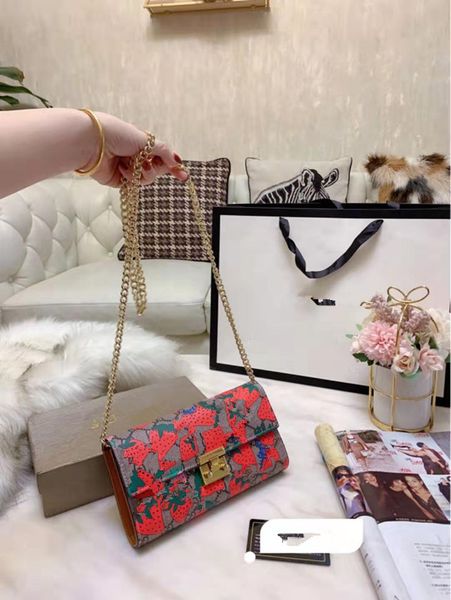 

vogue of new fund of printed chain inclined genuine leather handbag shoulder bags lock change coins single packing the designer handbags