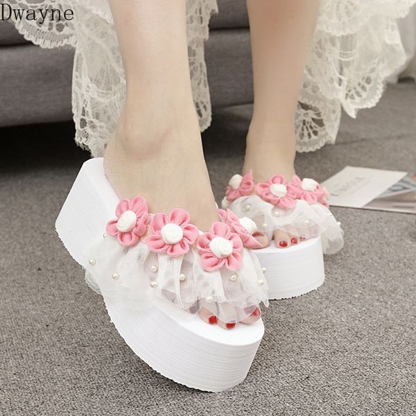 

beach slippers female flowers female summer wear high-heeled muffin thick-soled fashion holiday tide flip-flops, Black