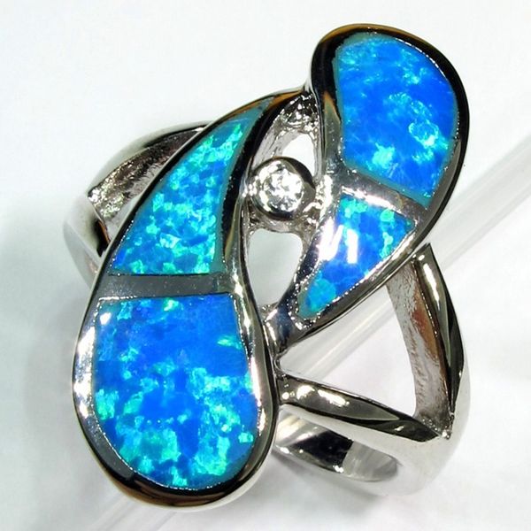 

shunxunze flash sale blue opal with white cubic zirconia charms european rings jewelry for women wedding party rhodium plated r174 size 7 8, Silver