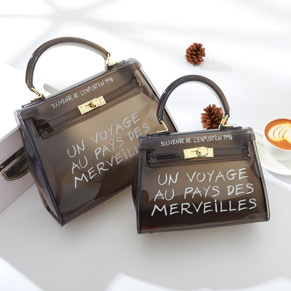 

manufacturers wholesale 2019 transparent fashion bag trend letter jelly bag hand-held women's single shoulder slant span