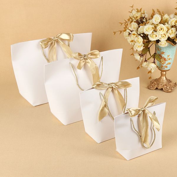 

10pcs present box wedding gift bags large size box pack bag pajamas clothes packaging gold handle paper bags with ribbon