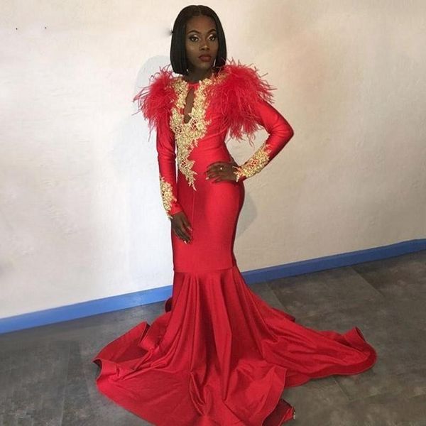 

2020 long sleeves gold appliques feathers satin formal mermaid prom dress black girls keyhole neck long red evening gowns