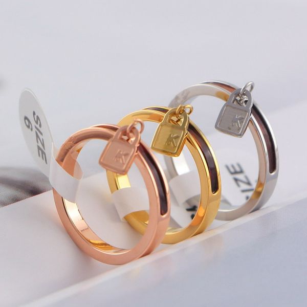 

style fashion brand jewelry lady titanium steel leopard print carving k letter 18k gold with lock pendant rings 3 color, Slivery;golden