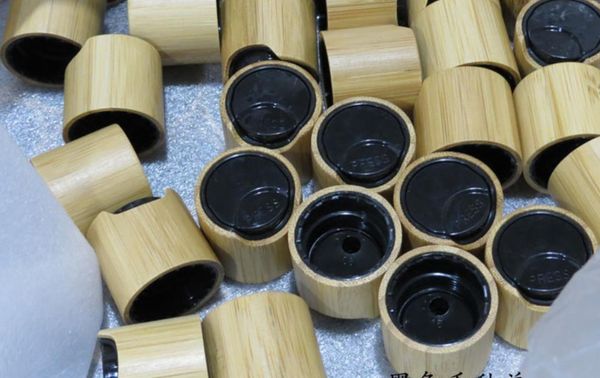 

300pcs 24/410 bamboo black essential oil press pump cover essence liquid chiaki cap for lotion/mulsion bottle makeup disc lid