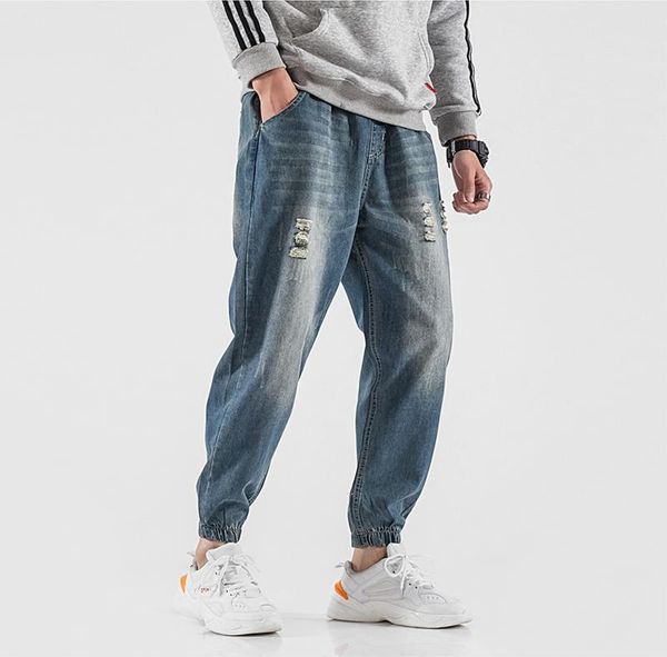 

2019 spring new cotton hole jeans men's plus fat large size thin feet pants korean version streetwear blue ing