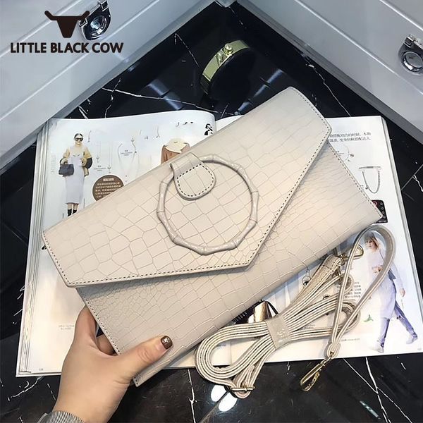 

высокое качество женщин из натуральной кожи клатчи сумка крокодил шаблон кольцо элегантные сумки женские делопроизводство конверт