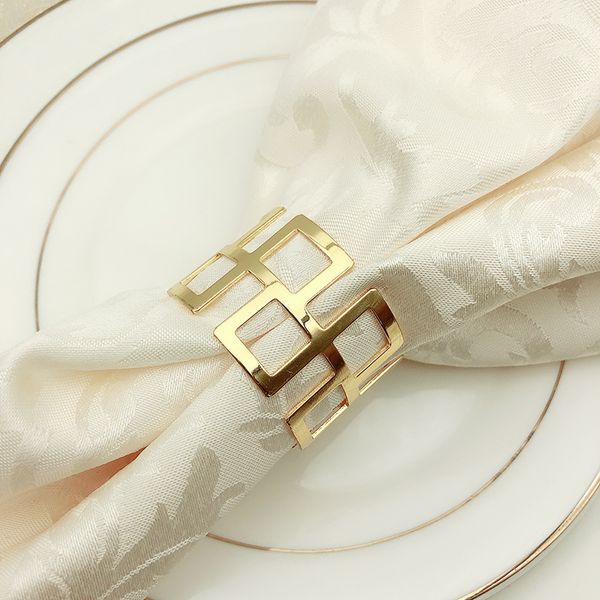 

napkin ring golden silvery mat towel hoop swing table creative table napkin circle high grade l western restaurant articles 2 9hw p1