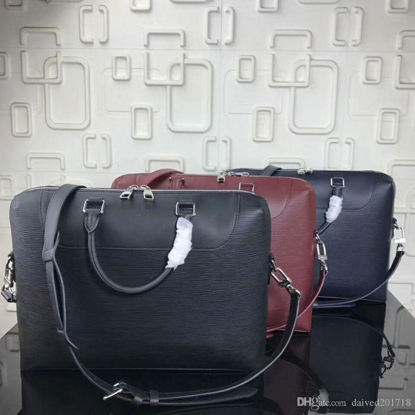 

new european classic luxury style bag, male and female general briefcase, pure color and genuine leather making silver metal alphabet