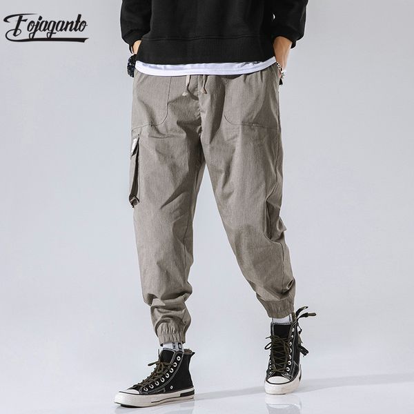 

fojaganto tide марка мужчины повседневные брюки новый мужской сплошной цвет простой drawstring штаны мода multi-карманный cargo мужской, Black