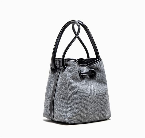 

designer handbag autumn and winter design cloth drawstring button bucket bags thousand bird pattern simple lamb hair bag shoulder bags 6