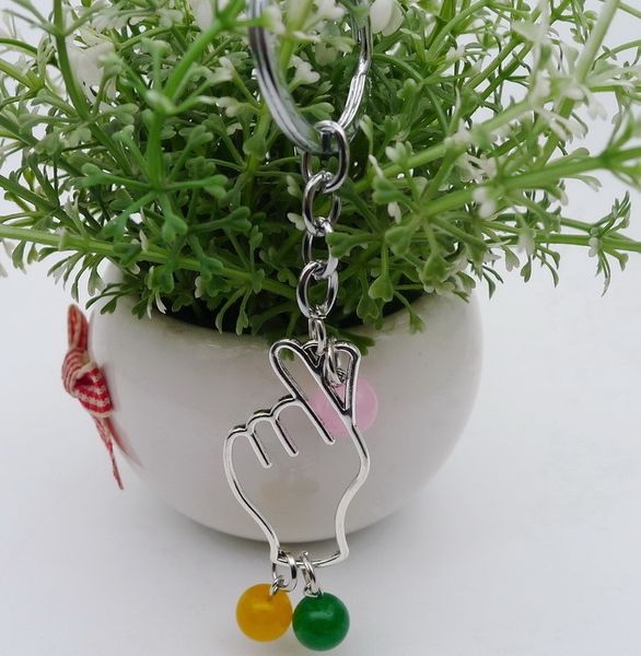 

alloy hollow out hand than edema with the heart involved crystal pendant key pendant buckle ancient silver ornaments parts, Slivery;golden