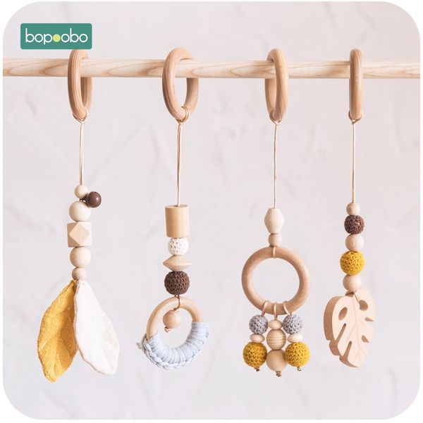 

bopoobo baby wooden chain chewable bracelet baby mobile wooden teether leaf rattle toy can chew bpa baby teething gifts y200111