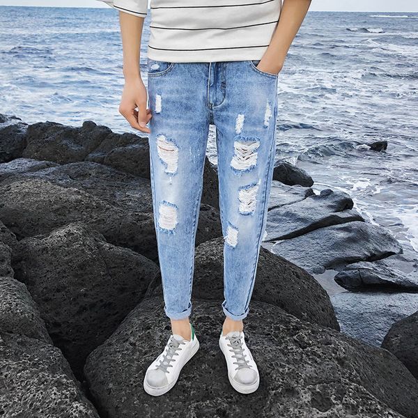 

boys with holes in jeans 2019 korean version slim bottom nine-minute pants with light blue trend