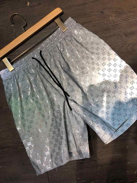 

2019 new luxury de igner ca ual men 039 hort nake pattern flower embroidery men 039 wimming hort high treet fa hion medu a be