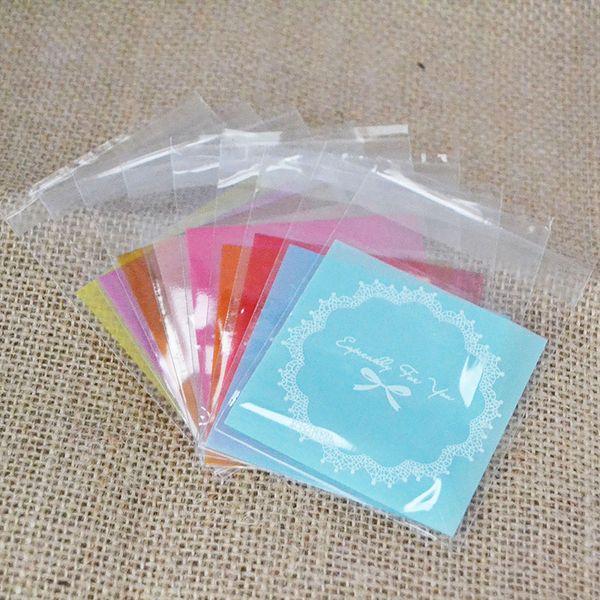 

50pcs 7*7cm multicolor plastic lace wreath bag candy cookie gift bag frosted opp birthday party candy packaging