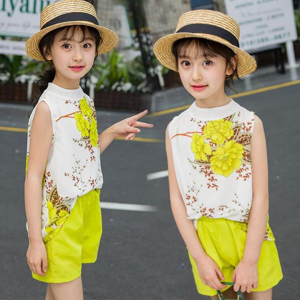 

одежда для девочек лето новой детской без рукавов сетки цветка рубашка + шорты 3-12 случайного костюм, White