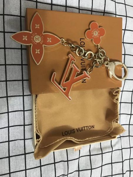 

louis vuitton keychain дизайнерские мужчины и женщины брелок новый высокое качество роскошный брелок дизайнерская сумка кулон сумка мода бес, Silver