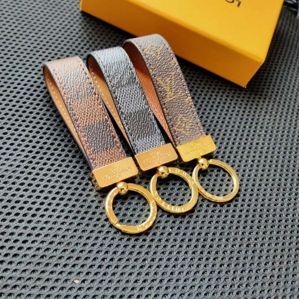 

высокое качество кожаный сплав пряжка брелок брелок дизайнеры бренд брелок дизайнеры мужчины женщины автомобильная сумка брелок с коробкой j, Silver