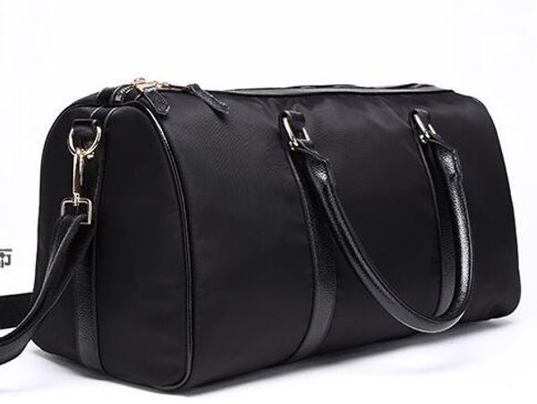 

Fa hion luxury men women travel bag leather duffel bag famou brand de igner luggage handbag large capacity port bag tote 55cm