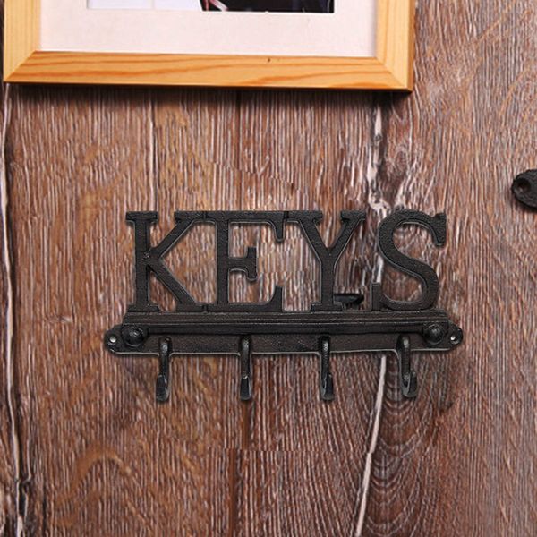 

cast iron wall mounted 4 hook key holder - rustic, vintage style rack with hooks for keys