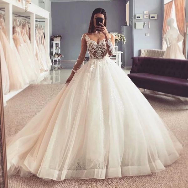 

sparkly sequined skirt wedding dresses illusion bodice sheer long sleeve lace tulle bridal gowns gorgeous luxury custom made, White