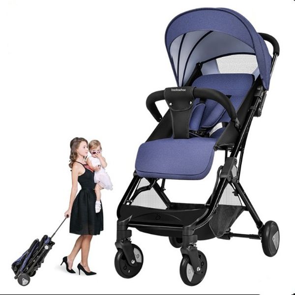 

baby trolley can sit on a four-wheeled child trolley which can be laid down and folded in an ultra-light portable baby