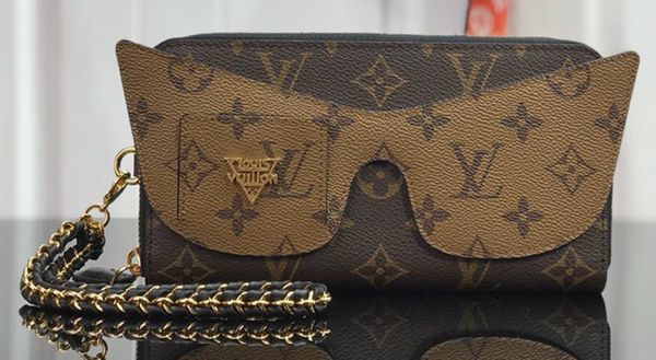 

ZIPPY SHADES M68796 Zippered Money Clip Canvas интерпретирует многофункциональный дизайн с использованием съемных плетеных цепей, чтобы легко обернуть вокруг вашего W