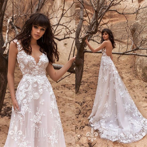 

gorgeous bohemian wedding dress v neck appliqued sleeveless backless ruffle bridal dresses custom made robes de mariée, White