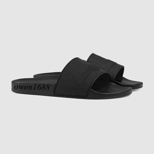 

Горячие продажи-мода черные резиновые сандалии слайд резиновые шлепанцы тиснением мужские и женские на открытом воздухе пляжные плоские тапочки